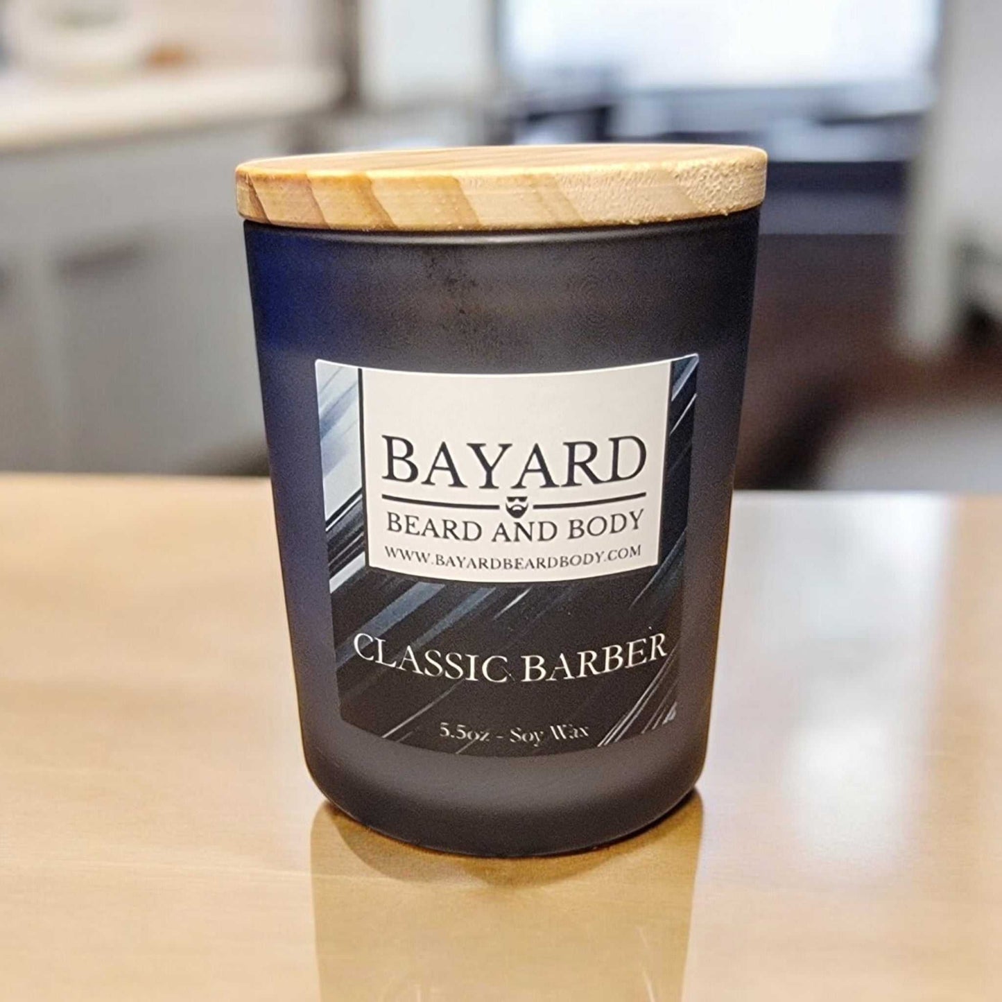 classic barber soy wax candle on a wood table