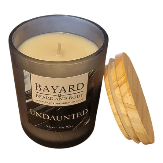 undaunted soy wax candle on a white background